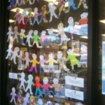 Paper dolls created by local children during the Week of the Young Child