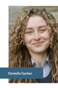 Close-up portrait of a person with curly hair and a collared shirt.