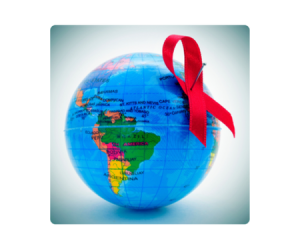 A globe with continents visible and a red AIDS awareness ribbon pinned on it.