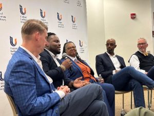 Five individuals seated in a panel discussion in front of a "United Lutheran Seminary" backdrop.