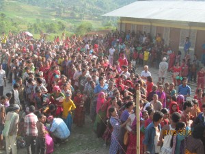 People lined up to receive relief distribution in Jeevanpur, Dhading. Credit - UMN