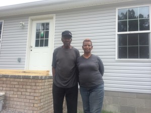 Warfields from Brookport in front of their new home