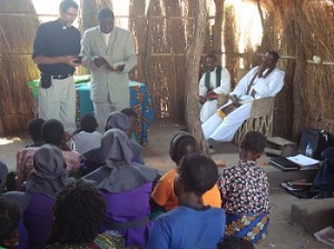 Philip Knutson joins a worship service in Zambia.