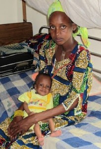A mother and her 9-month-old child, who is being treated for severe malnutrition, at the Emmanuel Health Center in Gallo, CAR.