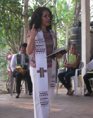 The Rev. Patricia Cuyatti preaches during a visit to the Guatemalan Lutheran Church.