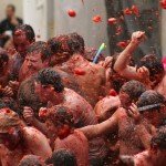 The traditional -- and very messy -- tomato food fight of the La Tomatina Fiesta of Buñol (Valencia), Spain.