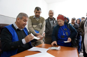 Gorgya Paols receives a food voucher that provides her a carton of food that will last for one month.