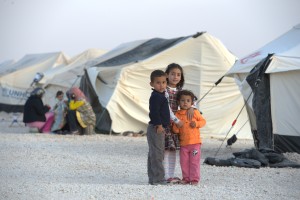 Children in the Zaatari Refugee Camp, located near Mafraq, Jordan. Opened in July, 2012, the camp holds upwards of 20,000 refugees from the civil war inside Syria. International Orthodox Christian Charities and other members of the ACT Alliance are active in the camp providing essential items and services.
