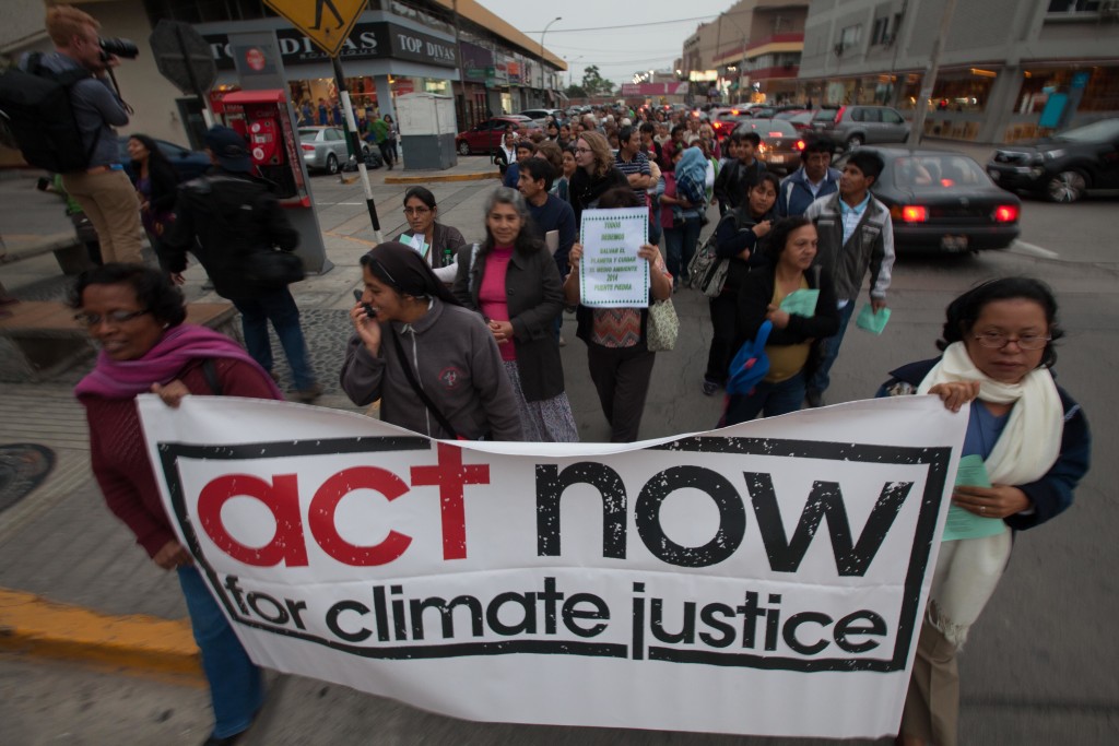 On the eve of the first day of COP20, the UN climate talks in Lima, a Vigil for the Climate was held near the Pentagonito where the UN talks are to be held. Christiana Figueres, the head of the UNFCCC and Manuel Pulgar-Vidal the Peruvian Minister for the Environment and President of the UN meeting, spoke to the crowd and a symbolic lighting of candles began the celebration that marks the end of one year of monthly fasting by religious and environmental groups around the world in the Fast for the Climate.