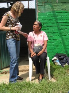 Elena (seated) with Stephanie (Amextra staff)