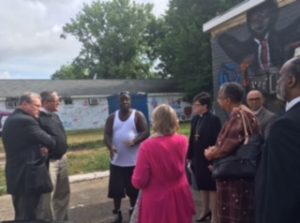 Group listening to Jamal a local community member and friend of Alton Sterling.